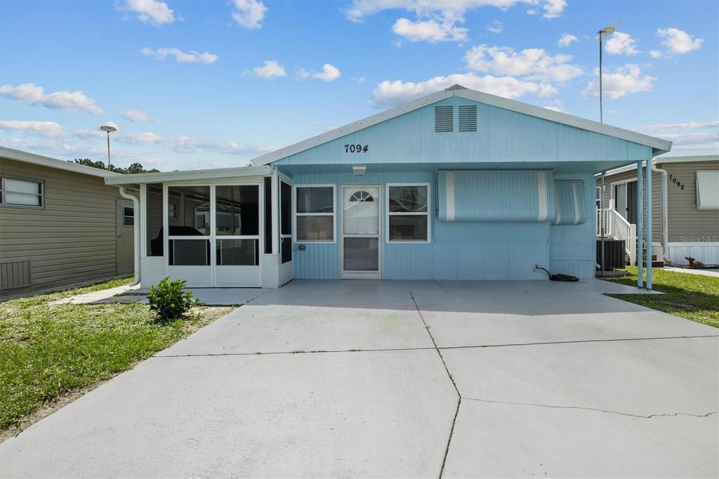 Photo of 7094 Fairview Village Circle, Winter Haven, FL 33881 (MLS # S5128614)