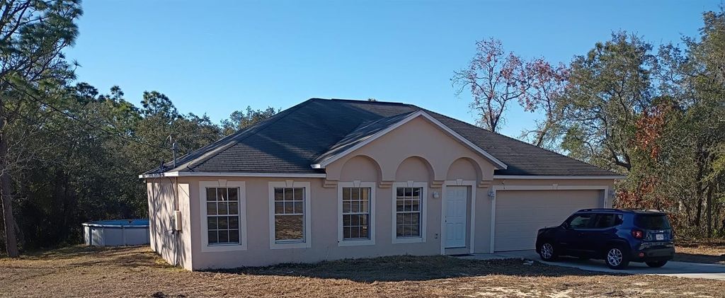 Photo of 10367 Flycatcher Road, Brooksville, FL 34613 (MLS # O6375576)