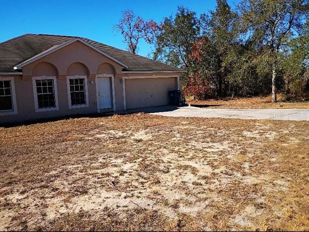 Photo of 10367 Flycatcher Road, Brooksville, FL 34613 (MLS # O6375576)
