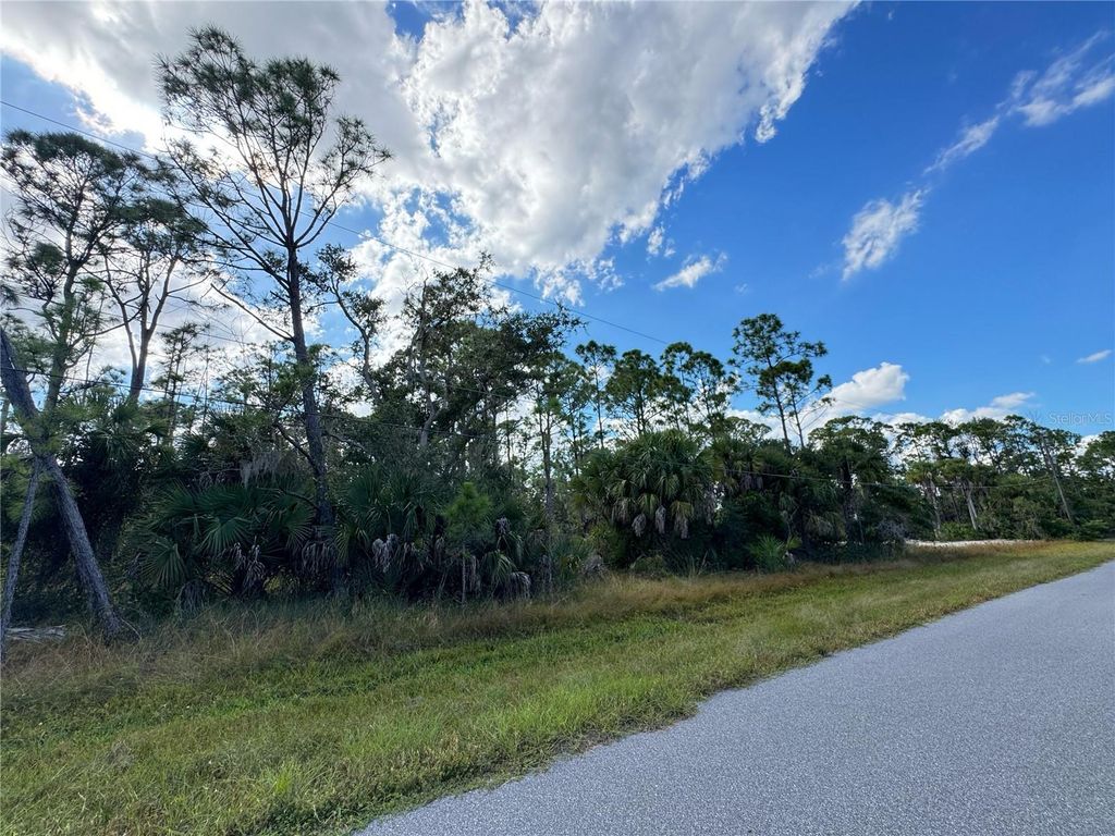 Photo of 1185 Hammacher Lane, Port Charlotte, FL 33953 (MLS # C7516519)