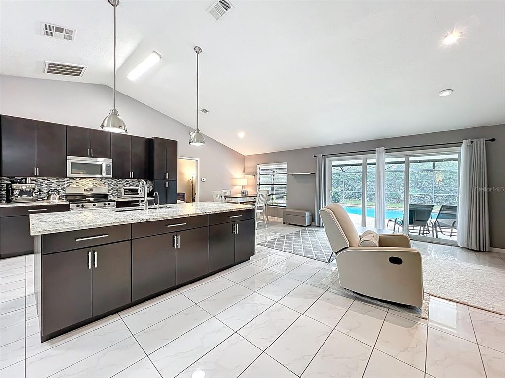 Photo of 9966 Kendal Drive, Orlando, FL 32817 (MLS # O6373683)