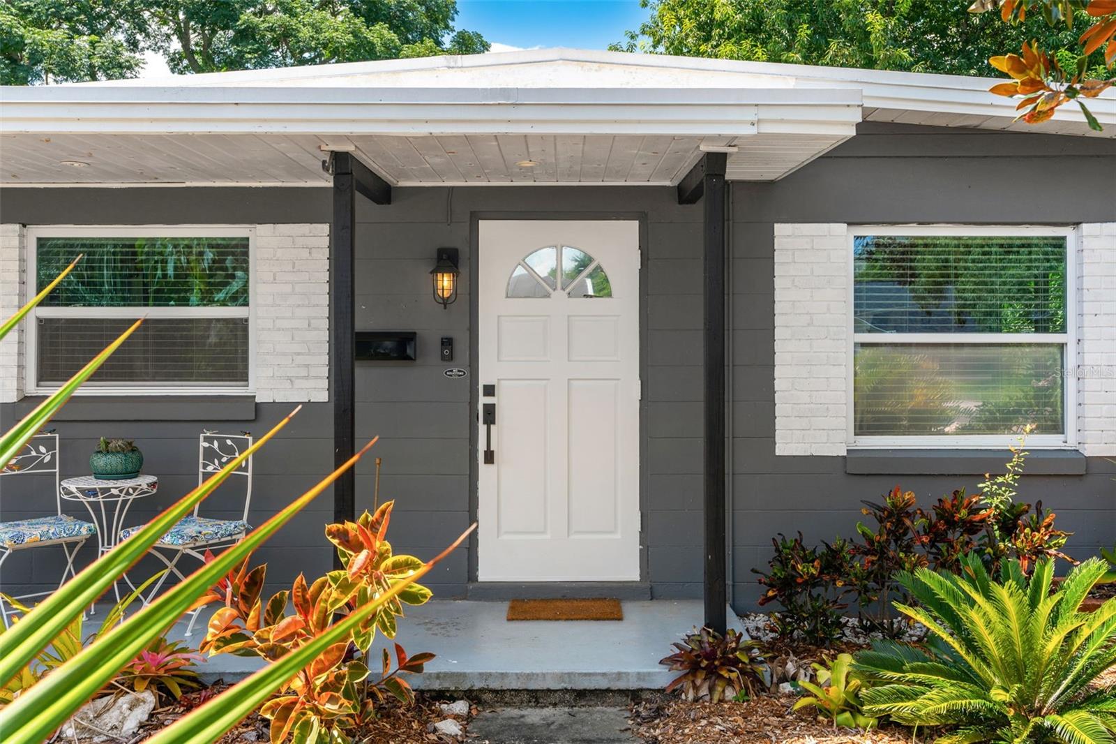 Chic, Sunlit, and Surprisingly Spacious. Your First or Next Perfect Home Awaits. This light-filled, midcentury-influenced gem pairs clean lines with joyful energy and thoughtful functionality. From the moment you arrive, the xeriscaped front yard greets you with low-maintenance beauty, no sprinkler system or green thumb required. Inside, light pours into the open layout, where a banquette dining nook offers the perfect spot to sip your morning coffee while overlooking the backyard.
With three generously sized bedrooms, there’s room to spread out, whether you're working from home, starting fresh, or scaling down. One bedroom even offers direct access to the fenced backyard, making it ideal for pet lovers or spontaneous evening hangouts by the fire pit.
Need bonus space? The oversized shed is ready to become your dream gym, office, workshop, or creative escape. Whether you're setting up your first home or downsizing into something with personality and purpose, you'll appreciate the flexible interior, space for a small home office or entry nook, and a kitchen that flows effortlessly into the living room.
Located just minutes from I-4, Downtown Orlando, Winter Park, and a variety of shops and restaurants, this home proves that style, simplicity, and location don’t have to be out of reach. Why rent when you can own a home that gives you room to grow, space to breathe, and a yard to call your own?