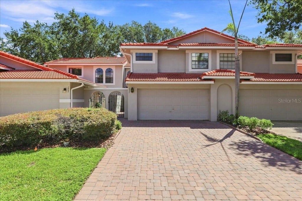 Photo of 7537 Fenwick Cove Lane, Orlando, FL 32819 (MLS # O6437088)