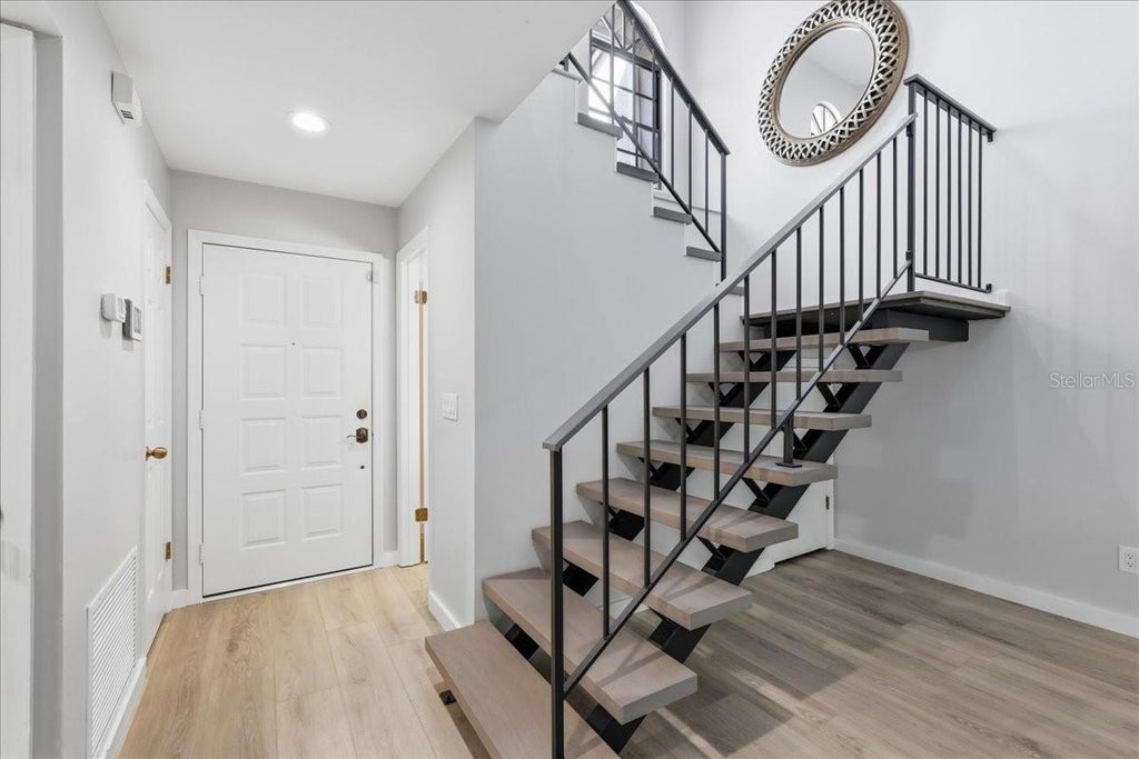 Photo of 7537 Fenwick Cove Lane, Orlando, FL 32819 (MLS # O6437088)