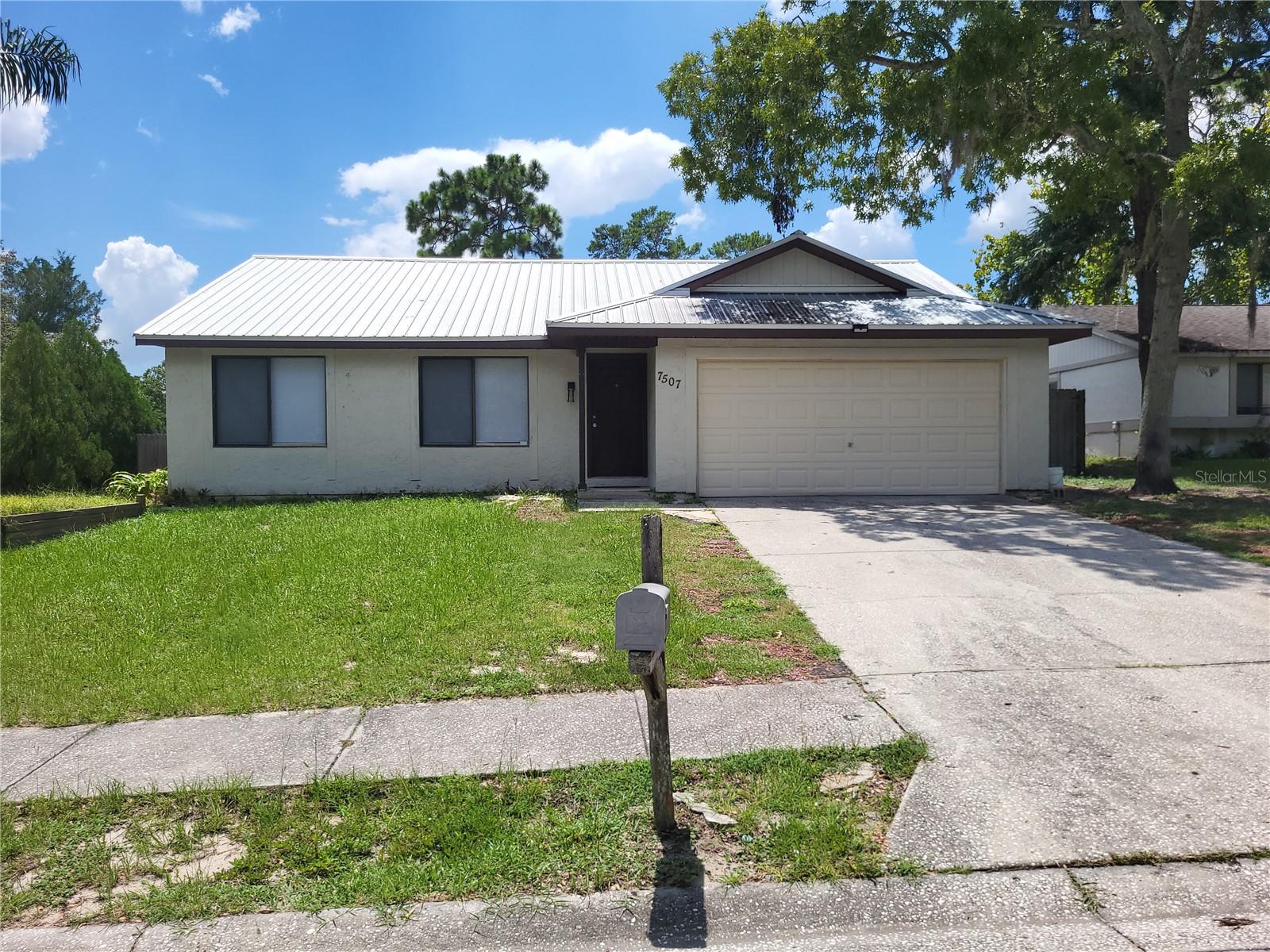 Corner home site in the Glen at River Ridge with convenient access to shopping and great schools. This home features 3 bedrooms, 2 baths, and a 2 car garage, new laminate floors, newer metal roof, fenced back yard and use of community pool.