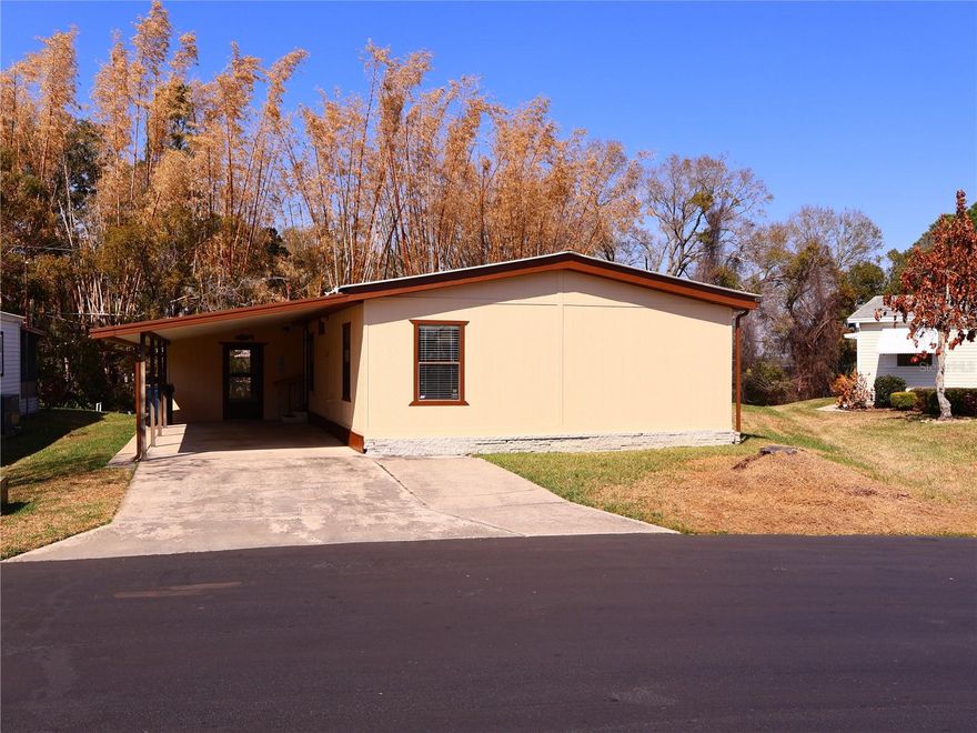 Affordable canal front home with owned land. No lot rent! Move-in ready 2BR/2BA home with 1,152 sq. ft. of living area in an established 55+ community. Enjoy peaceful canal frontage, open living areas, and a screened patio with lake views. Convenient to downtown Auburndale, shopping, and highways.