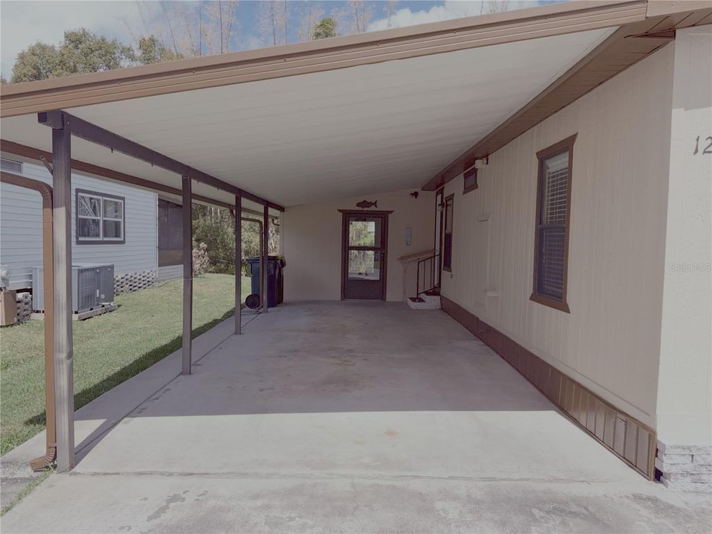 Photo of 129 Jana Circle, Auburndale, FL 33823 (MLS # S5144521)