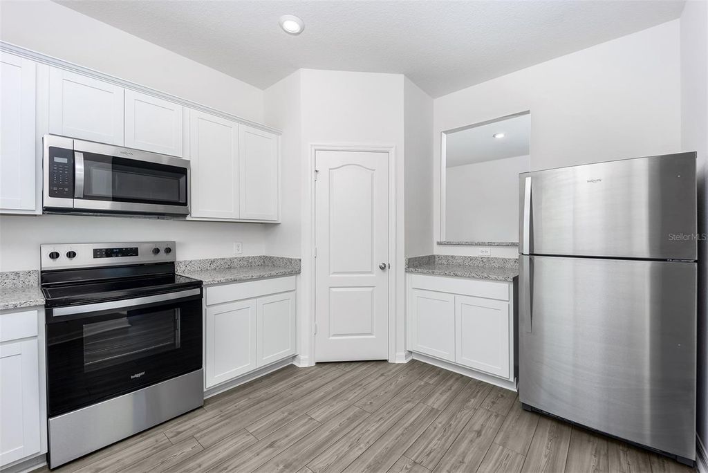 Photo of 3707 Bergamot Street, Lake Alfred, FL 33850 (MLS # TB8442853)