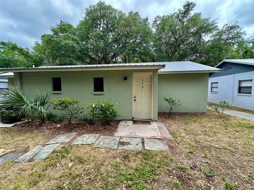 3-bedroom, 1-bath concrete block home nestled in a quiet 11-unit community of detached single-family residences. Recently renovated with new flooring, fresh paint, updated kitchen cabinets, fixtures, and new appliances. Conveniently located just off Waldo Road. Trash and lawn care included. Additional units in the community are available, ranging from $1,375 to $1,600 per month.