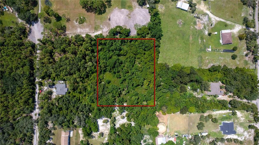 2.5 Acres with Endless Possibilities in Deltona! Bring your vision to life on this spacious 2.5-acre Rural Agricultural property located in Deltona, Florida! With a minimum 1,000 sq. ft. build requirement, you have the freedom to create the home you’ve been dreaming of—whether it’s a single-family home, mobile home, or modular home. Even better, the zoning allows for an accessory dwelling such as a detached in-law suite, workshop, or garage. This versatile property also permits a variety of uses, including home-based businesses, houses of worship, hobby breeding, communication towers (up to 70 feet), animal shelters, and more—truly offering opportunities limited only by your imagination. A well and septic system will be needed, giving you full control of your setup.

Enjoy the best of country living while staying close to conveniences—Publix and I-4 are just 10 minutes away, and you’ll have quick access to SR-415 into Seminole County. Centrally located between Orlando and Daytona Beach, you can reach world-class attractions, beaches, and shopping in less than an hour—all without the heavy traffic.

If you’ve been searching for the perfect blend of rural charm, flexibility, and convenience, this Deltona acreage is it!