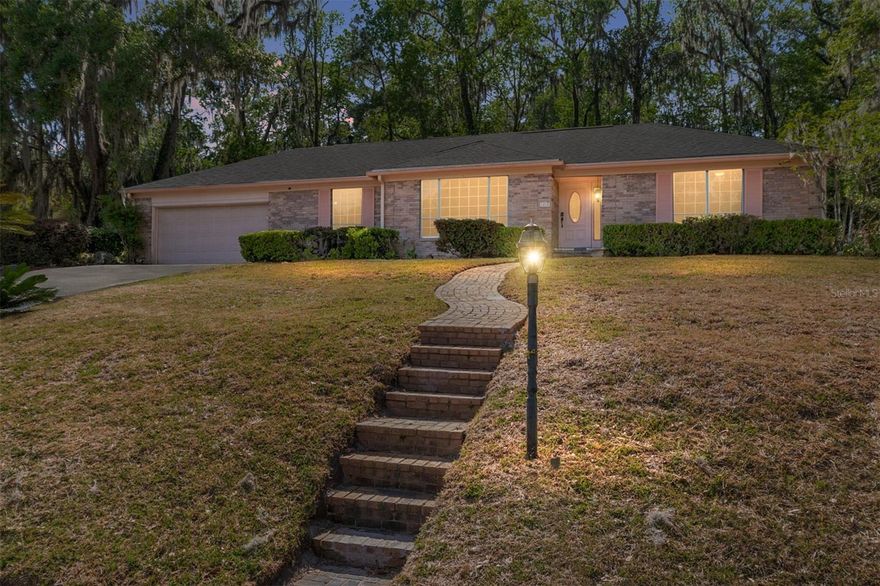 Welcome to a rare Gainesville opportunity with a story you almost never see — this custom-built brick home at 1410 NW 28th Street has had just one owner since it was built in 1967 and has never before been offered for sale. Set on approximately one-third of an acre with no HOA, this 3-bedroom, 2-bath home offers timeless character, solid construction, and a location that is hard to beat.

With approximately 1,920 heated and cooled square feet and around 2,500 total square feet, the home offers generous living space, including a separate breakfast room, spacious garage, and multiple living areas that give buyers flexibility for everyday living, entertaining, hobbies, or working from home. Inside, the home is filled with natural light and has been refreshed with brand-new upgraded carpet in the bedrooms and professionally installed luxury vinyl plank flooring in the front living room and dining room, along with fresh interior paint throughout, creating a clean and move-in-ready feel. These were not basic builder-grade selections, but quality materials chosen to give the home a more elevated feel.

Major updates have already been tackled, including a brand-new 2026 roof with transferable warranty and a brand-new gas water heater. A recent four-point inspection is also available, giving buyers added confidence that the major systems have been reviewed and are in good working order.

What makes this property especially compelling is the combination of location, lot size, and freedom. There is no HOA, and the home is located with impressive proximity to the University of Florida — close enough to enjoy the energy of game days and even hear activity from Florida Field. With short-term rentals allowed, buyers may also appreciate the flexibility this property offers, whether for primary living, a second home, or an investment-minded purchase.

The home still offers room for a new owner to make it their own. The kitchen and bathrooms are functional and well-kept, with a charming retro feel that some buyers may love as-is while others may choose to update over time. The property also features a notably steep driveway, which buyers should be aware of. That said, this is a solid, substantial, move-in-ready home, and it has been priced accordingly with the understanding that a future owner may want to make additional tasteful finish updates over time. In exchange, buyers will find a well-built, well-maintained home with character, space, and a setting that is becoming harder to find.

This is not a cookie-cutter house. It is a home with history, substance, and potential — refreshed where it counts, honest about where a buyer may want to personalize, and full of opportunity in one of Gainesville’s most convenient locations.
