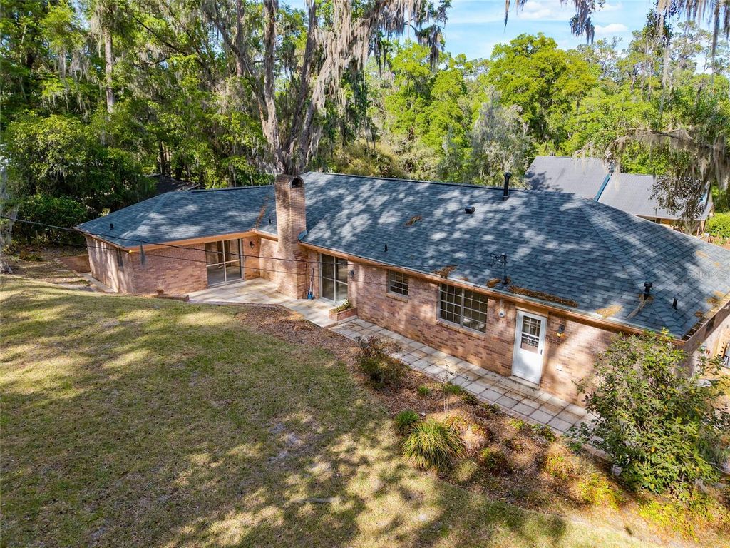 Photo of 1410 NW 28th Street, Gainesville, FL 32605 (MLS # GC539428)