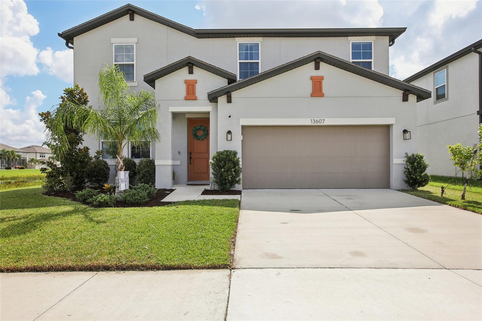 One or more photo(s) has been virtually staged. Seller Willing to Contribute Toward Buyer’s Closing Costs! Welcome to your move-in ready dream home, built in 2021 and located on a premium lot in the highly sought-after Reserve at Pradera community. With 2,608 sq. ft. of beautifully designed interior living space, this spacious oasis features 5 bedrooms, three full bathrooms plus a flex space which can be used as formal dining or den. Add to that, the stunning pond view and natural light thanks to large windows throughout. The open-concept layout seamlessly connects the kitchen, living room, and dining nook, making it perfect for both relaxing and entertaining. Enjoy easy indoor-outdoor living with sliding glass doors leading to your east-facing screened lanai and fenced backyard—ideal for morning coffee or unwinding in the evenings. The luxurious primary suite includes a massive walk-in closet (big enough to be its own room!) and a spa-like bathroom featuring a soaking tub, separate glass-enclosed shower, and dual vanities. Additional upgrades include:Granite countertops throughout, Solid wood cabinetry, and Recessed lighting. ENERGY STAR® certified construction for long-term energy savings
Community amenities include a resort-style pool, kids' splash pad, dog park, playgrounds, and miles of scenic walking trails—perfect for enjoying Florida’s natural beauty. Conveniently located just minutes from top-rated St. Joseph’s Hospital South. Daily shopping and dining options are numerous and the interstate is ready to connect you to all Tampa Bay has to offer.
Don't miss your chance to call this incredible home yours—schedule a showing today!