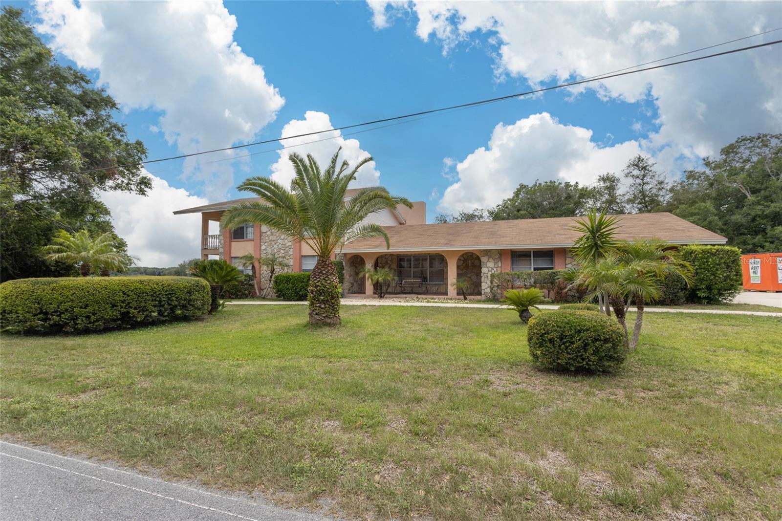Stunning Two-Story Home Overlooking Moultrie Creek
Welcome to this unique and spacious two-story concrete home offering 3 bedrooms, 4 bathrooms, and breathtaking views of Moultrie Creek. Set on nearly half an acre, this property combines comfort, function, and charm in every corner.
The primary suite is a true retreat—featuring a private walk-out balcony with serene views of the creek and pool area. Its en-suite bathroom is impressively spacious—large enough for ballroom dancing—and includes its own private balcony for morning coffee or sunset reflections.
Upstairs, you’ll find two additional bedrooms, each with private en-suite baths and walk-in closet, perfect for guests or family. A full bath on the main level serves both convenience and flexibility leading out to the yard providing convenience when having a pool day.
A separate in-law suite studio offers complete independence with its own kitchen, full bath with walk-in shower, and private entrance—ideal for extended family, guests, or rental income. The suite comes with it's own separate meter.
Enjoy outdoor living with a large pool, a cozy jetted jacuzzi, and a deck that overlooks the lush greenbelt and Moultrie Creek. Mature trees provide gentle afternoon shade without blocking the spectacular view.
Inside, the kitchen boasts a large breakfast island and a cozy nook, while the formal dining room—with its working coquina fireplace—has been reimagined as a second living area. The main living room can easily be converted into additional sleeping space.
This home is equipped with modern conveniences including a Springwell water filtration system, well and septic, and a fully wired ADT security system. The fenced yard ensures privacy and safety, and the oversized driveway accommodates 7–8 vehicles with ease.
This exceptional property blends natural beauty, privacy, and space—perfect for entertaining, relaxing, or multi-generational living.