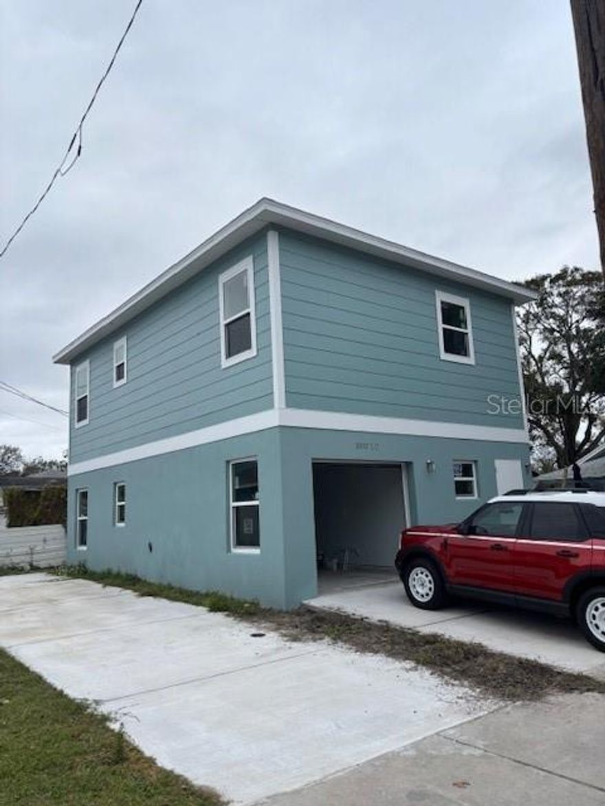 LOCATION, location, location! Tired of wall-to-wall apartments, management companies and complex living? Here is your opportunity to live in your own special haven in GREATER WOODLAWN, a very POPULAR NEIGHBORHOOD between MLK and 16th Street North, walking distance to restaurants/groceries, just two blocks from Rolling Oats, a short walk to Trader Joes, Fresh Market and close to all the activities of downtown St. Petersburg! Imagine, you will be the FIRST RESIDENT(s) of this ELEQUENT garage apartment, with an OPEN FLOOR PLAN, grey tone LAMINATE FLOORING, STAINLESS APPLIANCES and GRANITE COUNTER TOPS, WASHER/DRYER, HURRICANE RESISTANT WINDOWS and PLENTY of STORAGE. The ELECTRIC, WATER, SEWER and GARBAGE INCLUDED in monthly rent. This lovely home is PERSONALLY MANAGED by the OWNER, so ACT QUICKLY, it won’t last long!