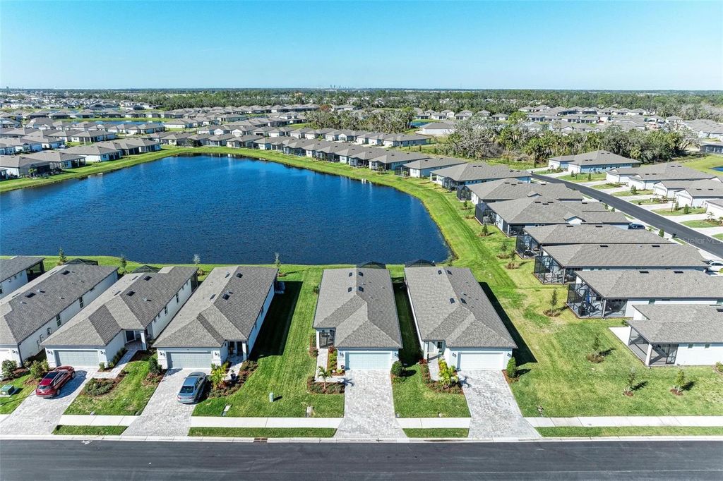 Photo of 9272 Ballaster Pointe Loop, Parrish, FL 34219 (MLS # O6355668)