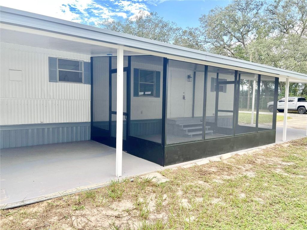 Photo of 35004 Hawkiowa Road, Dade City, FL 33523 (MLS # TB8432948)