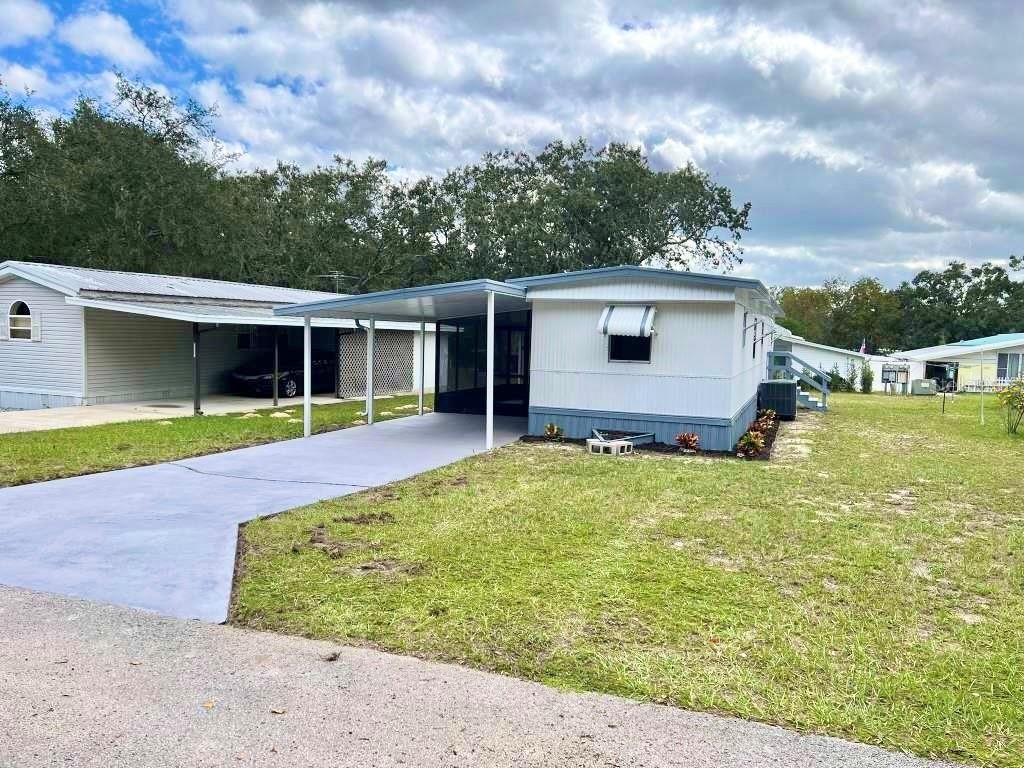 Photo of 35004 Hawkiowa Road, Dade City, FL 33523 (MLS # TB8432948)