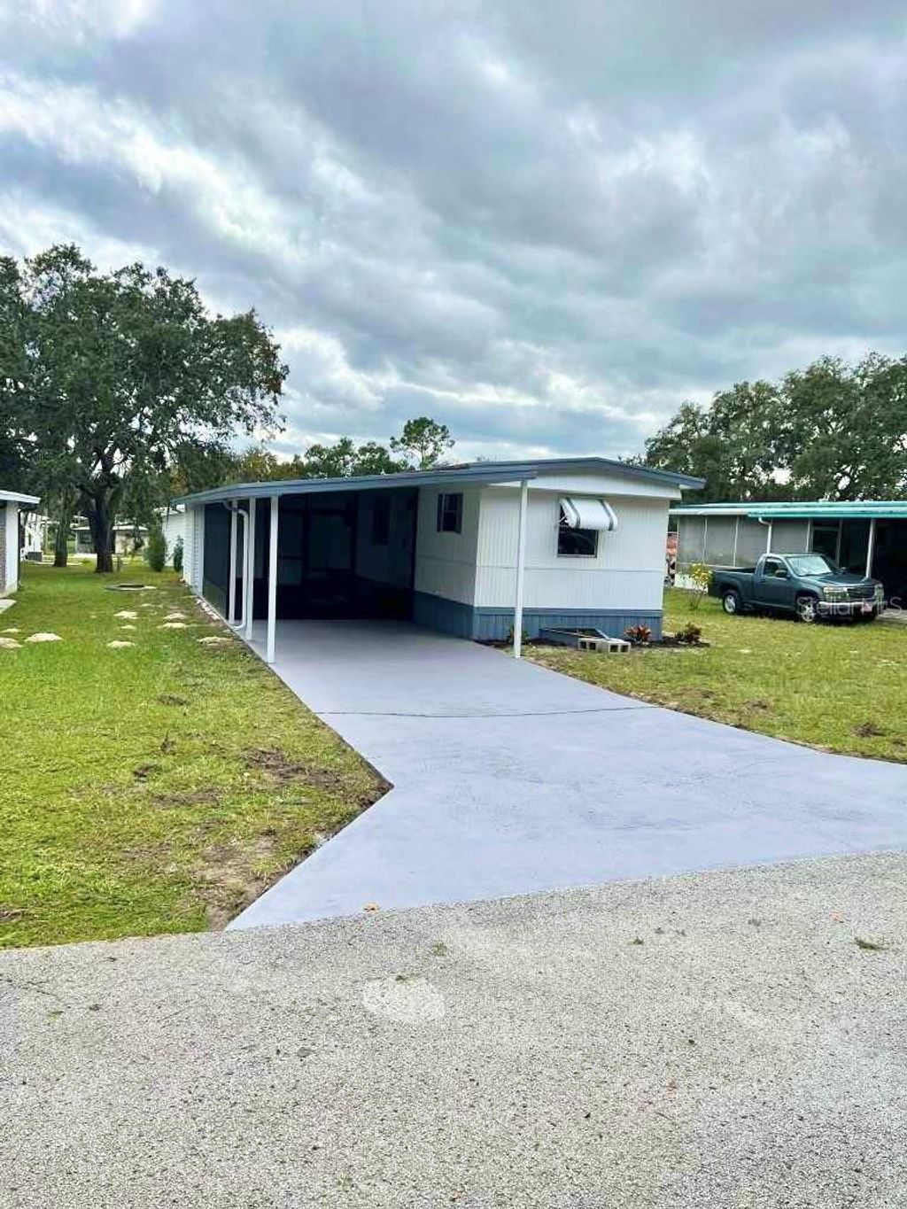 Photo of 35004 Hawkiowa Road, Dade City, FL 33523 (MLS # TB8432948)
