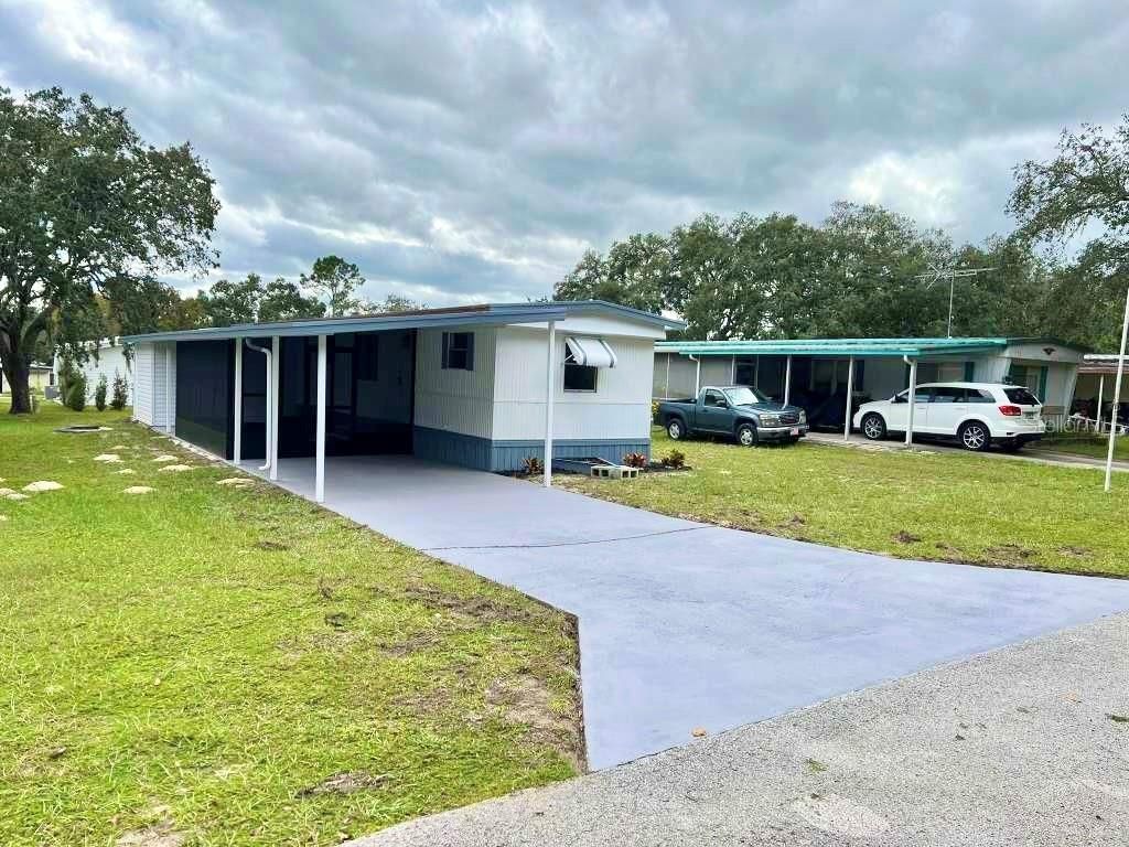 Photo of 35004 Hawkiowa Road, Dade City, FL 33523 (MLS # TB8432948)