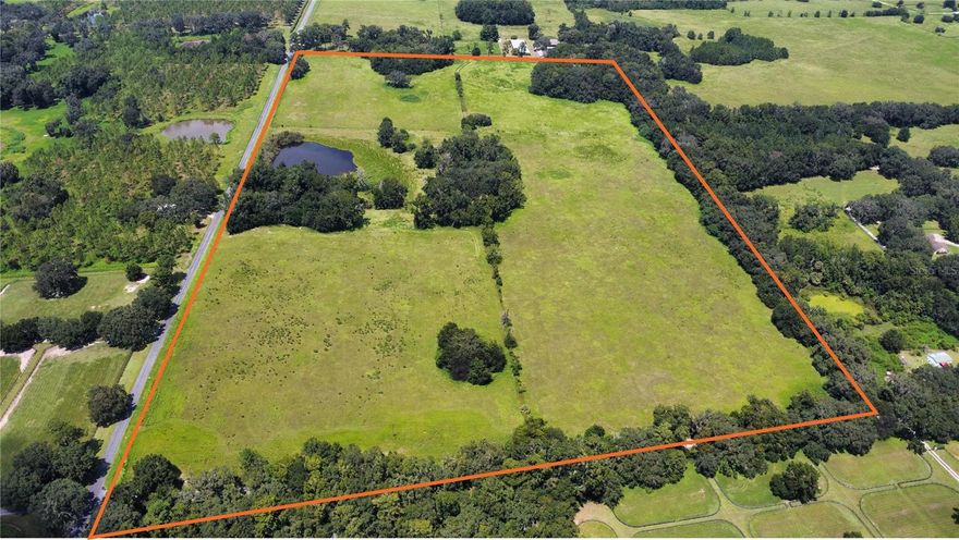 63.5 +/- acres in northwest Marion County, right in the heart of horse country. Just an 18-minute (12.9-mile) drive to the World Equestrian Center, 12 minutes (7.1 miles) to HITS Winter Circuit, and 20 minutes (12.9 miles) to The Shops at Foxwood (Publix, Starbucks, Gold’s Gym, and more). The property has a beautiful, gentle roll to it, a roughly 2-acre pond, and abundant wildlife (Osceola turkeys and whitetail deer). On our first walk of the property, we witnessed a mature 8-point buck in hot pursuit of a doe across the main field. Surrounded by hundreds of established farms and situated within the renowned Farmland Preservation Area, this property offers an ideal blend of seclusion and convenience. It’s an easy drive into Ocala with the promise of peace and quiet when you return home! This is an excellent opportunity to secure a personal sanctuary in one of Marion County’s most desirable equestrian areas.