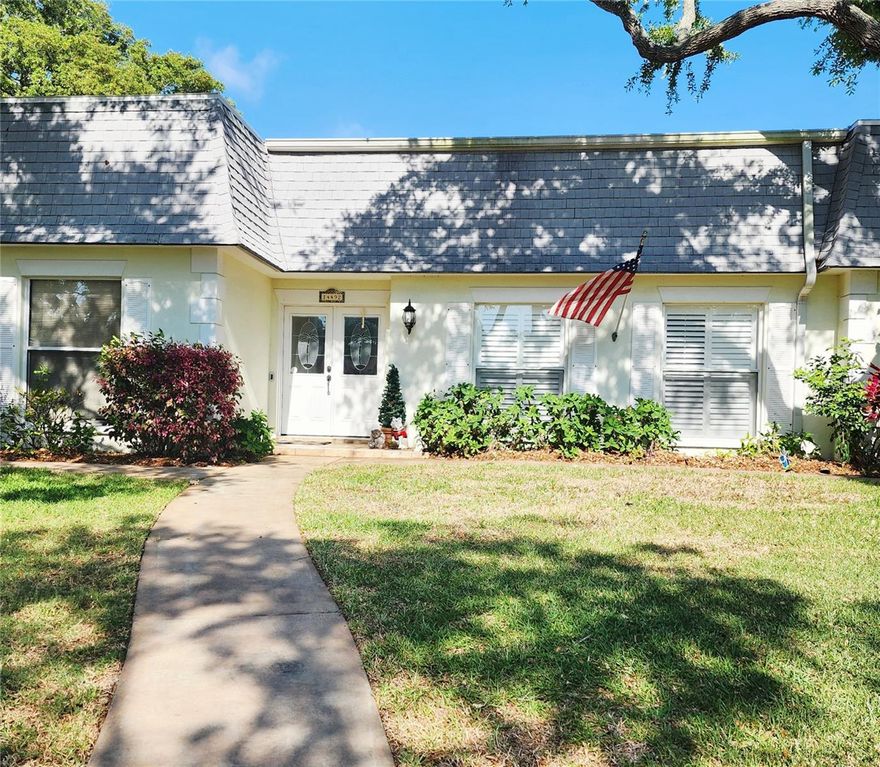 Location, location, location! Rarely available BAY HILLS neighborhood 3BR/2BA/2CG split-plan POOL home! Just two miles to INDIAN ROCKS BEACH, with world class fishing and boating at your convenience. Less than two miles to Walsingham Park with over 300 acres with miles of trails, a dog park and 100-acre lake with a kayak and small boat launch. Two miles to McGough Nature Park with a Raptor Rescue program and kid's ZIPLINE! Major league Baseball, Football and Soccer are all played less than an hour away. This charming BLOCK home sits on a QUARTER ACRE LOT on a tree-lined street, where peaceful days don't feel so far away. This is a FENCED corner lot with mature shade trees, lush landscaping, and plenty of driveway space. Featuring a distinctive Mansard/Gambrel-style roof (2017), this home offers curb appeal you don’t see every day. Step inside to find 2000+ square feet of bright, open living space with tile flooring throughout, crown molding, plantation shutters, and crisp window blinds. The spacious kitchen offers white cabinetry, neutral Corian countertops, and a breakfast bar seating four, opening perfectly into the main living and dining areas—ideal for entertaining. Enjoy the additional sunroom that leads out to a covered patio and your private backyard retreat. Outside, choose from the deck or paver patio area to sunbathe, or relax in your sparkling pool oasis with a waterfall feature. Perfect for Florida afternoons and weekend gatherings. The primary suite includes a large en-suite bath, walk-in closet AND regular closet, and a slider leading directly to the pool. Bedrooms two and three are located on the opposite side of the home along with the second full bath—ideal for privacy. Additional features include an inside laundry closet, two-car garage, and exceptional storage throughout. With your vision and some work, this Bay Hills gem could truly shine. Location, layout, and lifestyle won't wait! **SOLD AS IS FOR THE CONVENIENCE OF THE SELLER. OFFERS WELCOMED - if you are interested, don't wait!   *SHOWINGS BY APPOINTMENT ONLY*