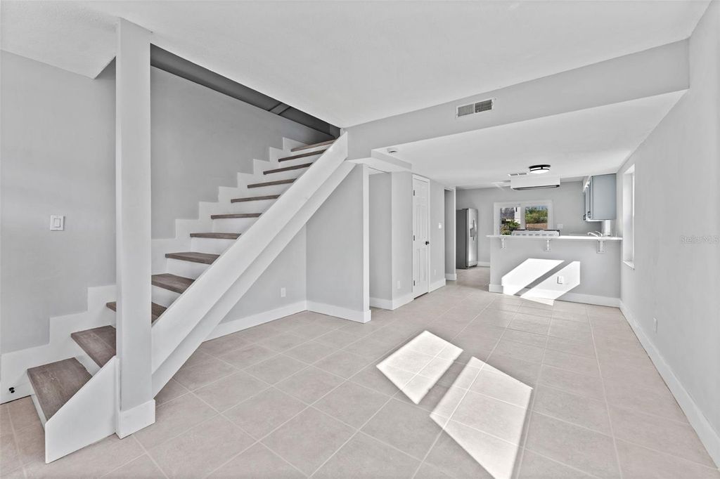 Photo of 8737 N Tangerine Place, Tampa, FL 33617 (MLS # TB8448855)