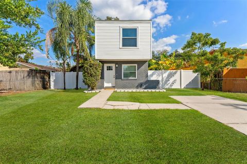 Photo of 8737 N Tangerine Place, Tampa, FL 33617 (MLS # TB8448855)