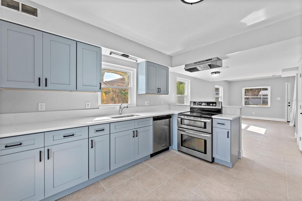 Photo of 8737 N Tangerine Place, Tampa, FL 33617 (MLS # TB8448855)