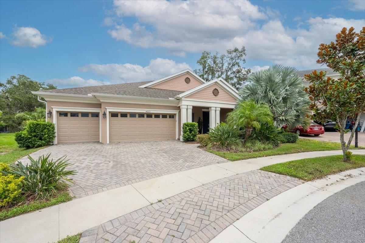 Spectacular WESTBAY Longboat floor plan offering one story executive living. Situated on an oversized .43 acre fenced lot backing up to a tranquil PRESERVE/CONSERVATION area. Located on a cul-de-sac in the highly sought after Fishhawk West community of "THE OAKS". This luxury 4BD/3BA 3-CAR GARAGE with huge bonus room and built-in shelving beauty also features an expansive great room with soaring beamed tray ceiling and an electric fireplace. Stunning high-end upgrades throughout elevate this home's sophisticated ambiance to BREATHTAKING ELEGANT LIVING! Enjoy the Gourmet Chef's kitchen complete with quartz counters, stylish tile backsplash, SS Appliances, Gas Cooktop, Custom Pantry, wood cabinets and a huge island perfect for entertaining. Enjoy wood-look plank ceramic tile flooring throughout the entire home except for the new carpet in 2 of the secondary bedrooms. The 3rd secondary bedroom located in the front of the home can be used as an office and has square ceramic tile with additional lighting. This home features CUSTOM SHUTTERS throughout. Enjoy the inviting large front porch as well as the rear Pergola and patio with brick pavers complete with a firepit. All overlooking the huge backyard with a tropical oasis feel. The outside has additional exterior lighting in front and back. The home is pre-wired for a pool, has debt free solar panels (which convey with the home) for lower utility bills. This energy efficient home also has a tankless water heater, freshly painted inside, and a transferrable termite bond. This resort style community offers a Lake House featuring a gathering room, state-of-the-art fitness center, game room and more. The community also offers two fantastic pools, one with a tot splash area, multiple playgrounds, scenic parks, dog parks and Central Park area for Lawn events. Fishhawk West offers miles of walking/biking trails. Conveniently located within walking and biking distance to top-rated schools, and is an easy commute to Downtown Tampa, Orlando Theme Parks, Gulf Beaches, World-Class Golf Courses and MacDill AFB.