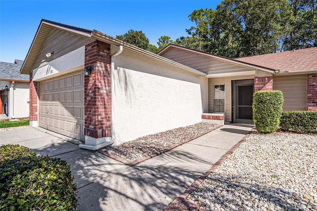 Photo of 11901 Snapdragon Road, Tampa, FL 33635 (MLS # O6357189)