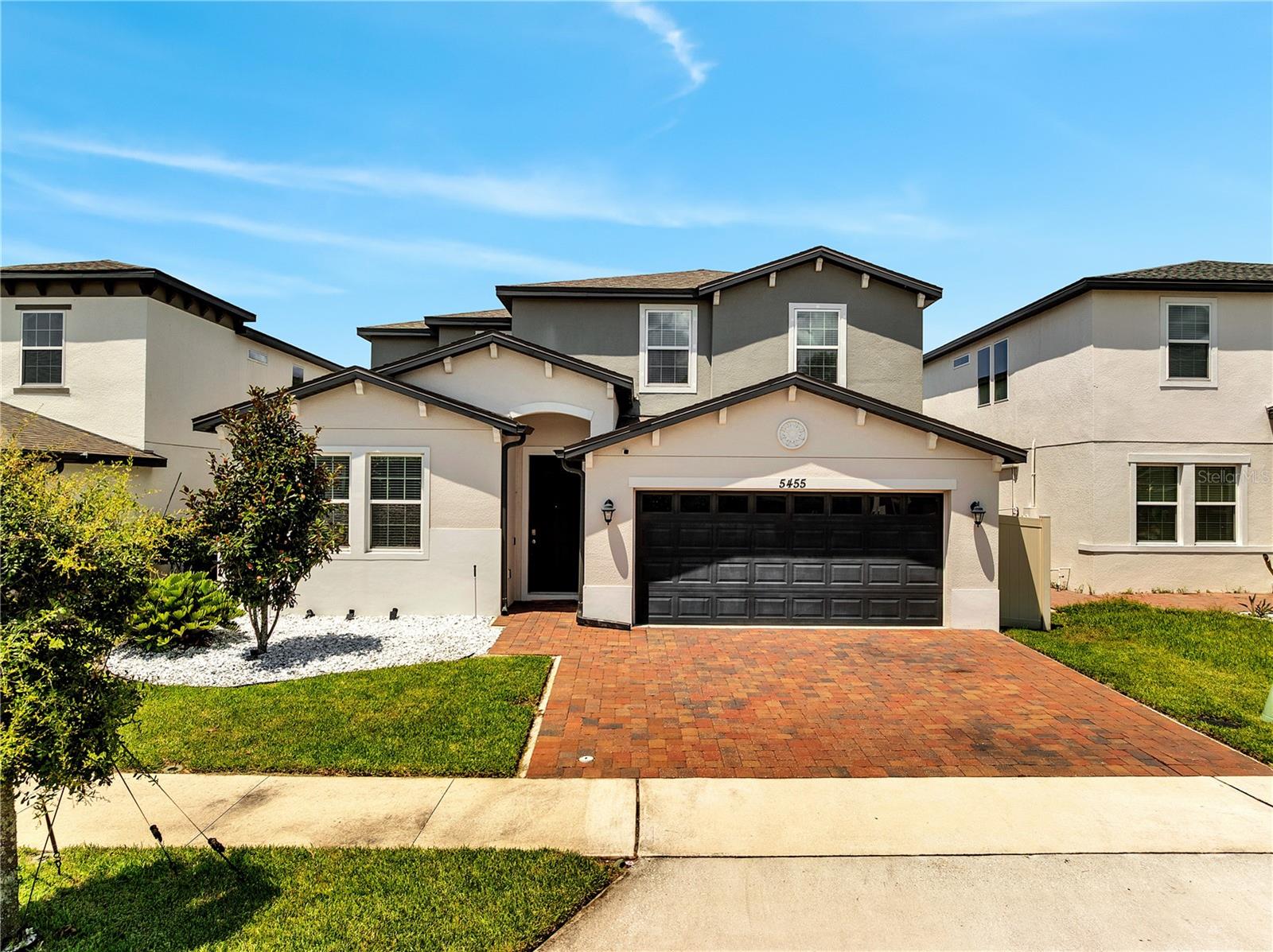 Welcome home to the beautifully designed Marbella floor plan by Century Homes, located in the Sunset Grove community of St. Cloud. This spacious two-story residence features 5 bedrooms, 3.5 bathrooms, a loft, and over 3,000 square feet of elegant living space, perfect for today’s modern lifestyle. The common areas boast stylish laminate flooring, while the bedrooms feature plush carpeting.
Upon entering, you are greeted by formal dining and living rooms that offer dedicated spaces for hosting elegant meals and entertainment. The large family room, along with a casual dining area, creates ideal spaces for gatherings. The chef-inspired kitchen includes 42-inch cabinets, granite countertops, an expansive breakfast bar, and ample storage.
For ultimate comfort and privacy, the primary suite is conveniently located on the first floor, featuring an expansive layout with a generously sized walk-in closet and an en-suite bathroom complete with a double vanity and a spacious shower with dual shower heads.
The thoughtfully designed upstairs loft offers versatile potential, ideal for a media room with cozy seating arrangements or as a second family room where loved ones can gather.
Three large bedrooms share access to a full-sized bathroom, thoughtfully equipped with modern fixtures and ample storage. Additionally, the fourth bedroom boasts its own private ensuite bathroom, ensuring convenience and privacy for guests or family members.
Embrace the Florida lifestyle with the screened lanai or the open paver patio in the fenced backyard, which overlooks a serene pond and has no rear neighbors. Residents can also enjoy a sparkling community pool and a convenient bike rack.
The perfect location places you just minutes away from Downtown Saint Cloud, East Lake Toho, the vibrant Lake Nona area, major roadways, Orlando International Airport, and the theme parks famous in Central Florida. Cancel the other showings; this one is yours!