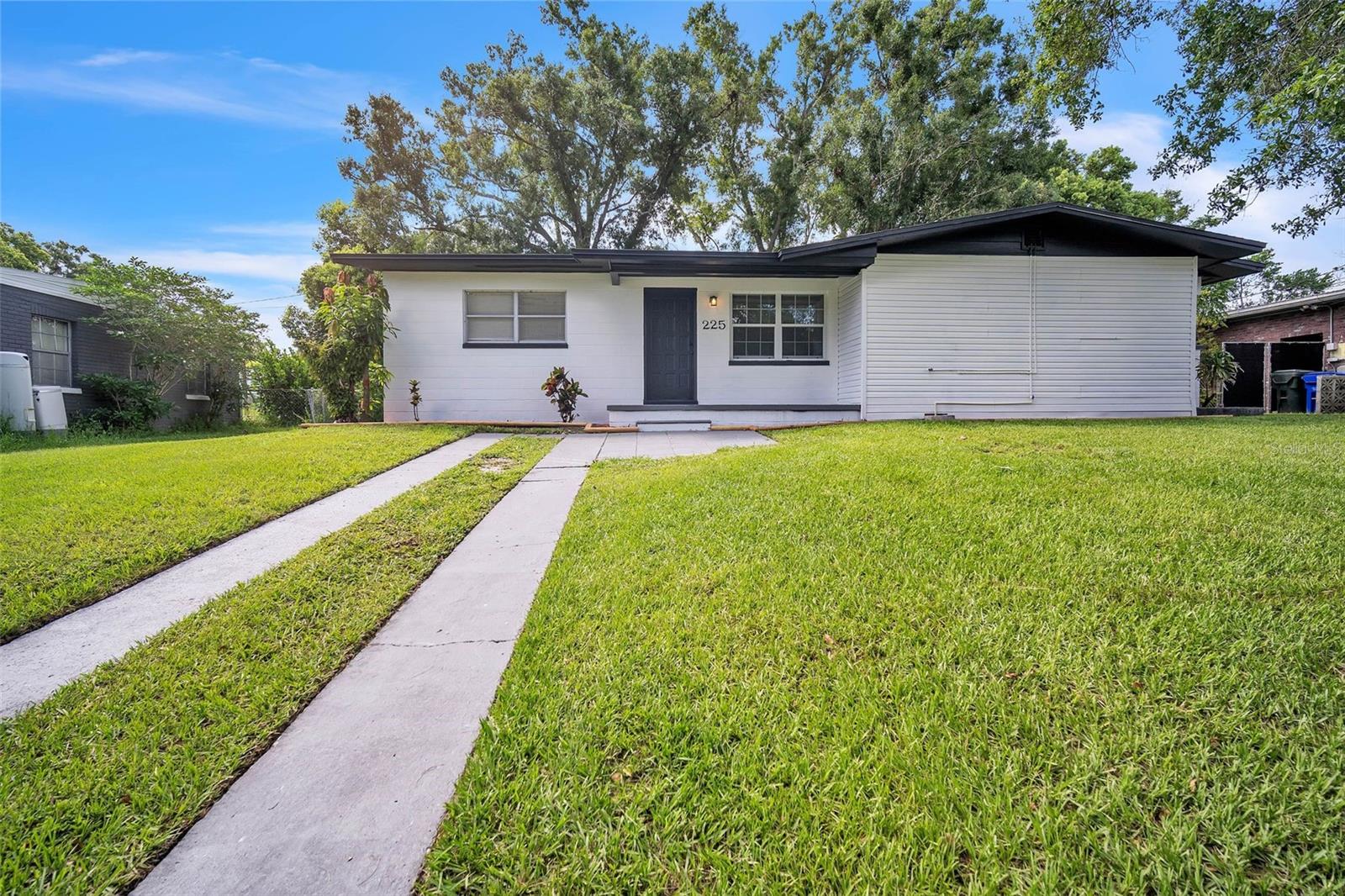 Newly remodeled 4 bedroom/2-bathroom home with a detached storage shed in the back! Beautiful interior with an open layout, separate living and dining areas. This home has gone through a total makeover from head to toe- NEW paint, lights, doors, fans and other fixtures in every room. ALL NEW gorgeous kitchen has a lovely kitchen island with barstool seating, new cabinets, backsplash, new quartz countertops and all brand-new stainless-steel appliances. New luxurious vinyl flooring throughout the entire home. NEW vanities, mirrors, toilets, and retiled showers in both bathrooms. Shaded slab patio in the back. NEW 2024 ROOF, new water heater. HVAC condenser is 2014 and handler is 2013- recently serviced and working well. Schedule a showing to see this beautiful home that could be yours now!!