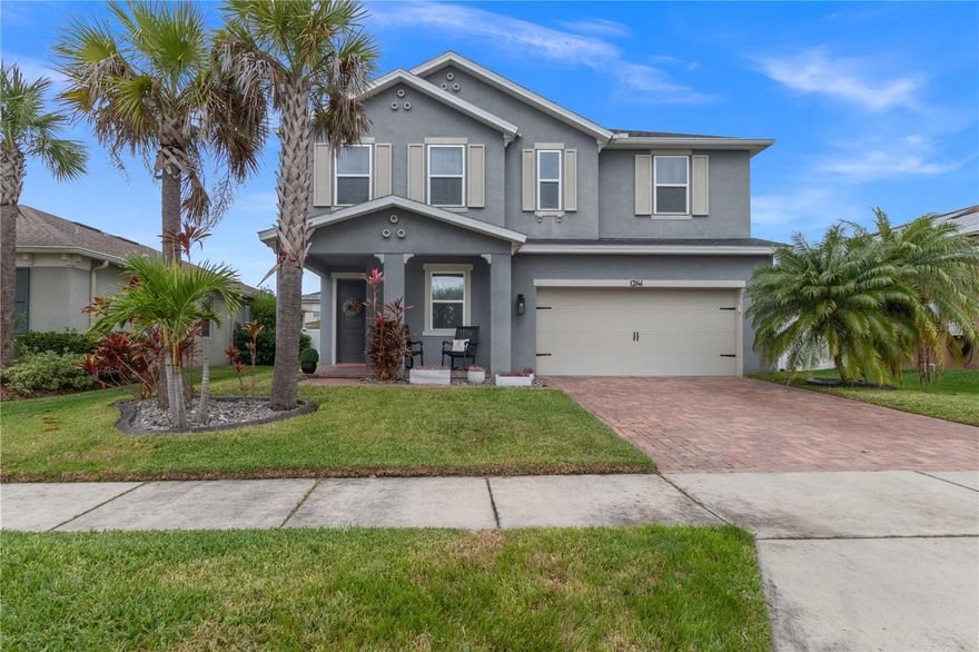 This elegant residence exudes modern comfort and convenience. Built in 2017, this contemporary home boasts 2,716 square feet of living
space, featuring five spacious bedrooms and three well-appointed bathrooms. The open kitchen design, perfect for entertaining, seamlessly transitions to a cozy coffee bar, promising warm morning moments. Further enhancing its appeal is the screened lanai, offering a serene
retreat for outdoor relaxation. Nestled within the sought-after GATED community of Villages of Trinity Lakes, this property promises a lifestyle of exclusivity with the added benefit of low HOA fees and no CDD fees. Its prime location ensures that numerous stores and local amenities are just a stone throw away, making it a highly desirable address for discerning homeowners. Exterior of home has been freshly painted!