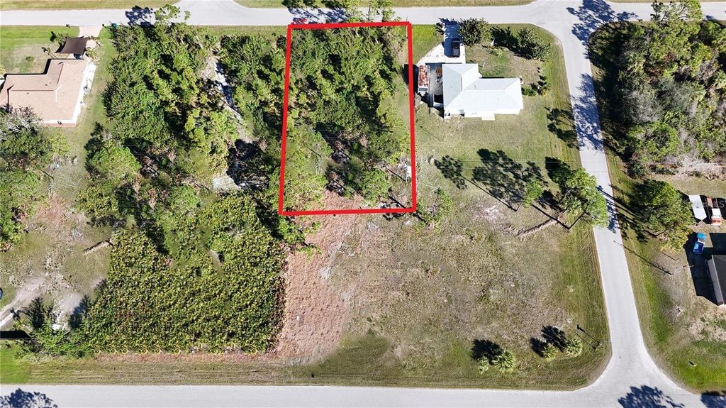 Photo of 12105 Terkelsen Avenue, Port Charlotte, FL 33981 (MLS # C7513417)