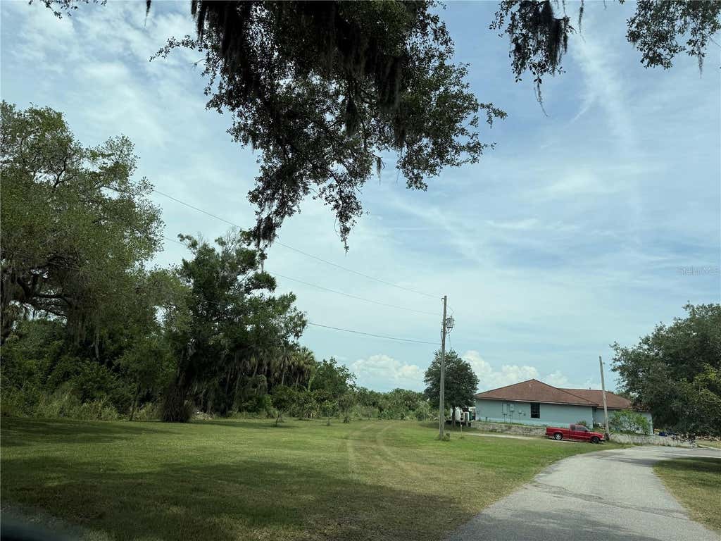 Photo of 3208 16th Ave E, Palmetto, FL 34221 (MLS # A4693387)