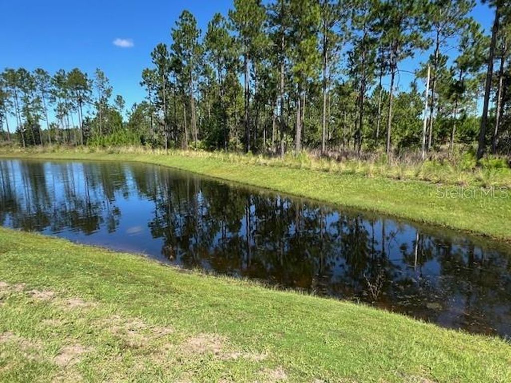 Photo of 22 Sawdust Lane S, Palm Coast, FL 32137 (MLS # FC311934)