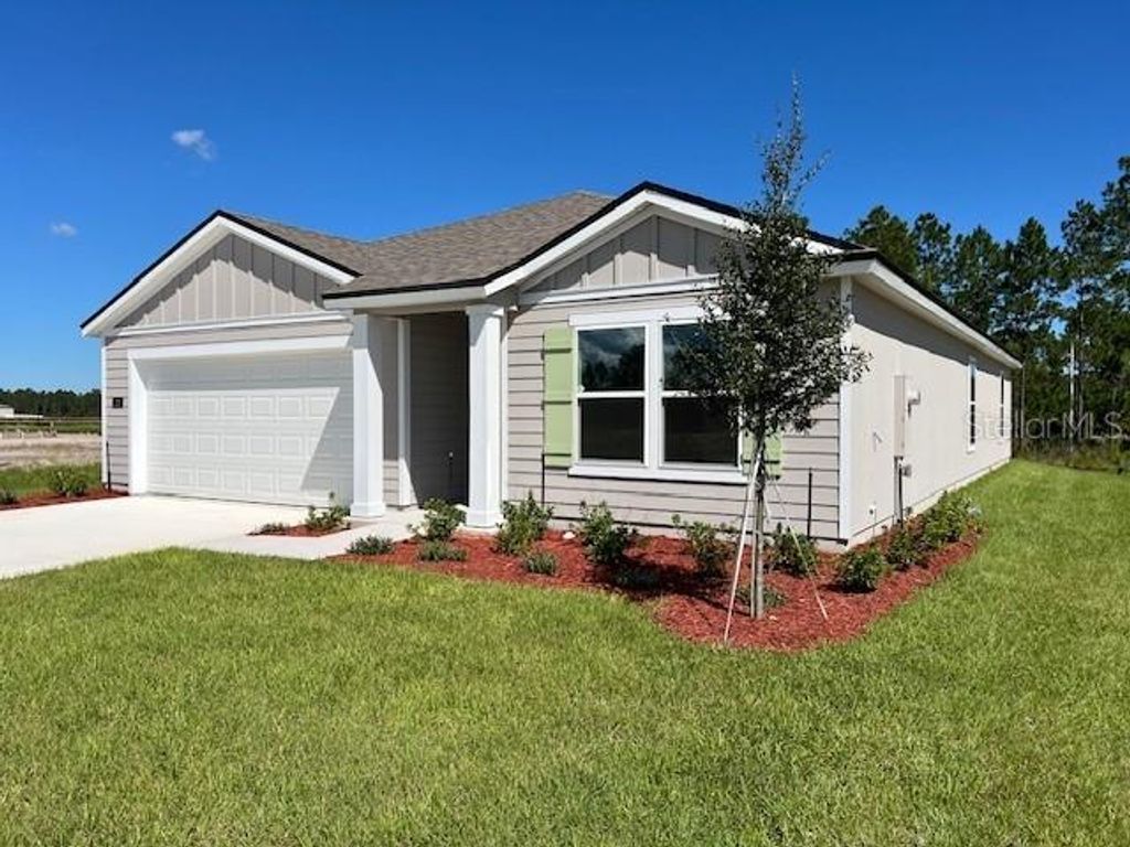 Photo of 22 Sawdust Lane S, Palm Coast, FL 32137 (MLS # FC311934)