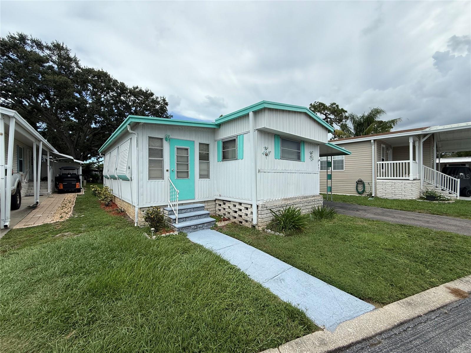 Welcome to this well-maintained 2-bedroom, 2-bath manufactured home located in the highly desirable 55+ community of Clearwater Cascade. This charming home offers 720 sq ft of bright and functional living space with a comfortable layout ideal for downsizing or seasonal living.
Enjoy the peace of mind that comes with low-maintenance co-op ownership and a monthly HOA that covers cable, water, sewer, trash, exterior maintenance, and access to a host of amenities. The community features two heated pools, a hot tub, sauna, clubhouse, fitness center, shuffleboard, and social activities year-round.
The home includes central air, a spacious carport, and a pier foundation. The updated kitchen flows into a cozy living area, perfect for entertaining or relaxing.
Small pets are welcome. This is a cash-only purchase and is ideal for those seeking an affordable, amenity-rich retirement lifestyle in the heart of Pinellas Park.
Key Features:
Active 55+ Co-op Community
Central A/C, Covered Parking
Two Pools, Clubhouse, Fitness Room
HOA Covers Most Utilities
Cash-Only Purchase
Contact us today to schedule a showing and make this your new Florida retreat!
