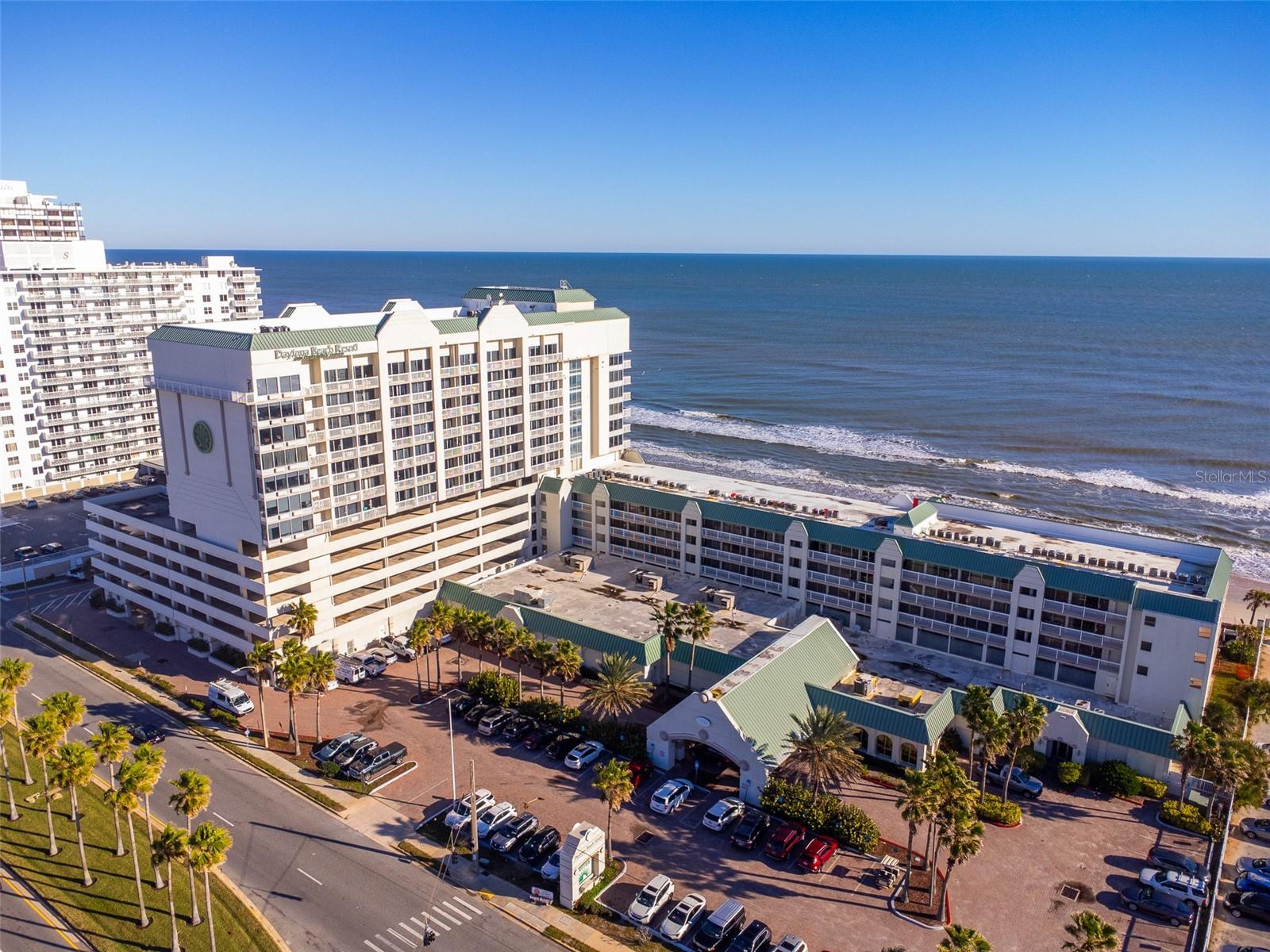 Do you dream of waking up to the song of the ocean waves and falling to sleep to their lullaby? This is the home for you! Ocean front resort, condo has a westward city view! Looking for an investment, vacation home or a combination of the two? Look no further! This home can be lived in by the owner for up to 364 days per year or it can be leased short or long term. This is a studio style home and comes fully furnished! The kitchen counters are quartz & the kitchen and bath have ceramic tile flooring. The Daytona Beach Resort features two outdoor, ocean front pools and an outdoor, ocean front, wading pool with a mushroom waterfall feature and beach entry. There is also a fitness room, sauna, one indoor heated pool and two indoors spas and one spa outdoors. There is an indoor restaurant, outdoor Tiki Bar, and fire pit! *All amenities are closed at time of listing for repairs. * The Daytona Beach Resort is located across the street from a shopping plaza complete with a Publix, Walgreens, retail shops and restaurants. It is a short drive to Daytona International Speedway and the Daytona International Airport, the Ocean Walk Restaurants and Cinema and Mainstreet Pier and Boardwalk and the Daytona Lagoon! All info in the MLS is intended to be accurate but cannot be guaranteed.
