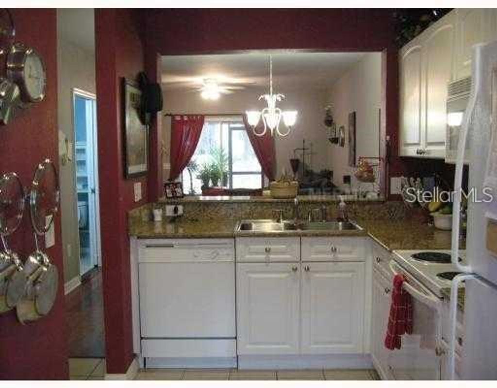 Photo of 4169 Plantation Cove Drive, Orlando, FL 32810 (MLS # O6389523)