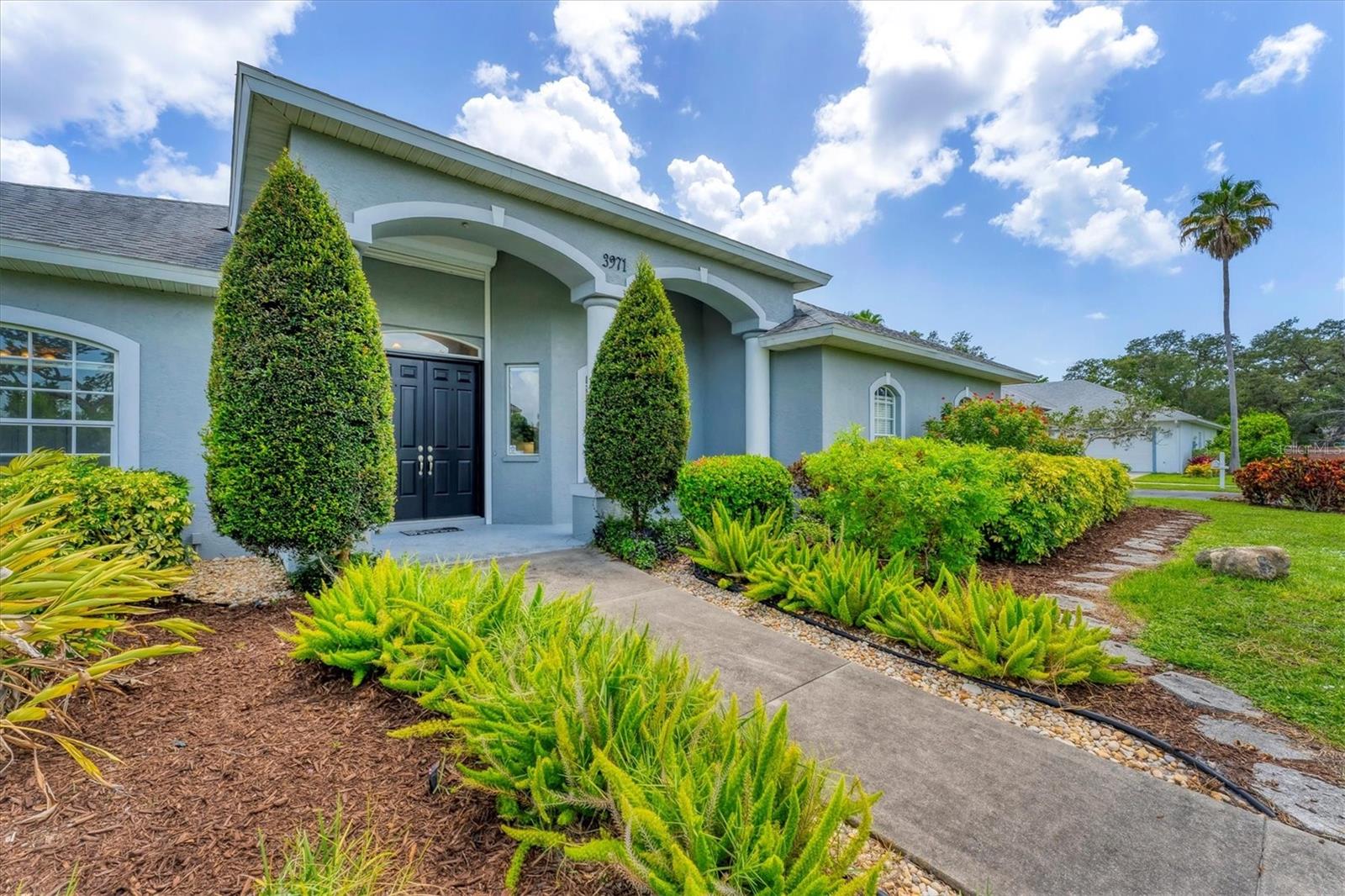 Opportunity Strikes! Great Location in Lovely Gated Neighborhood of Whispering Crane. Ready for Updates of your choice and priced accordingly. Grand home boasts high ceilings open floor plan, with pocketing sliders out to massive Lanai to private back yard with plenty of room for a pool. Split bedroom plan - primary and BR2 have sliders to Lanai. Roof 2018, Trane XR 2-speed 4 Ton 17SEER Heatpump HVAC 2015, Newer Washer & Dryer, Reverse Osmosis drinking water, Eat-in Kitchen, Well for Irrigation, City Water & City Sewer. LOW $800/yr HOA Fee, Lovely Corner Lot. Great Bones you can feel when you walk in. All concrete block construction in Zone X. Don't let this one slip away!
