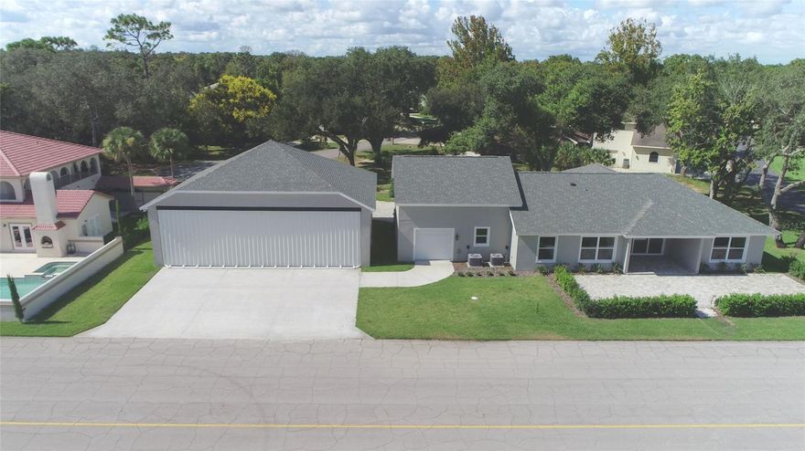 BEST OPPORTUNITY IN THE SPRUCE CREEK FLY-IN FOR A BRAND NEW HANGAR HOME! MODERN CONSTRUCTION + 12,350 SF LOT OPTIONAL, Beautiful 4 bedroom + office, 4 bath hangar residence located in the most social and widest Taxiway of Spruce Creek Fly-In. The stucco over block home features 3 bedrooms + office & large Bonus Suite w/full bath on the 2nd floor. European-Style Gourmet Kitchen offers custom cabinetry, Quartz Cascade Countertops, GE-CAFÉ Appliances w/gas range. Turkish polished Marble Floors and Engineered Wood in Bedrooms. Baths built with the best-of-breed materials and professionally designed, w/high-end Moet Plumbing Fixtures. Instant hot system water throughout. SOFT LED lighting inside and out. Over-sized garage for extra parking w/front & rear door for Golf cart w/direct access to Taxiway. 50x42 Hangar w/daylight LED lamps, epoxy covered hangar floor & very large ramp. Hangar single panel hydraulic door offers 14 extra feet of hangar "roof" giving you the extra shade to play or wash your plane. 19,000 Sf lot with the possibility to add an additional 12,350 Lot for additional $250,000 to increase your property size. Also includes irrigation well w/heavy-duty submerged pump, Underground Gas tank, and provision in the wall for Electric Range if you desire in the future. Residents can literally fly home to their private airport community, enjoy golf, tennis or dine at their country club. Spruce Creek Fly-In offers a 24/7 guard-gated community, private airport, has a 4,000' paved runway, paved taxiways, GPS approach and aviation services including fuel. It also offers an optional membership to the Country Club with activities consisting of Golf, Tennis, Pickleball, Olympic Size Pool, Fitness Center + Restaurant & Lounge to enjoy after your busy day. The community also offers an on-site public restaurant, hair salon and many other business services. Located close to shopping, restaurants, banks, schools and medical facilities, & a short drive to the ocean, beaches.. ;Water: City