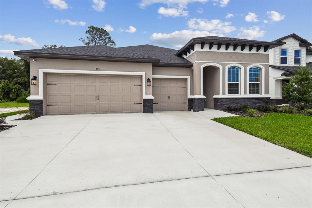 Photo of 11303 Striped Bass Court, New Port Richey, FL 34654 (MLS # TB8401978)