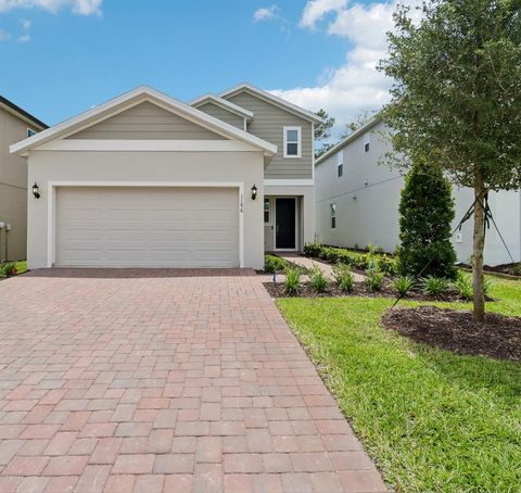 Photo of 1196 Happy Forest Loop, Deland, FL 32720 (MLS # O6390896)
