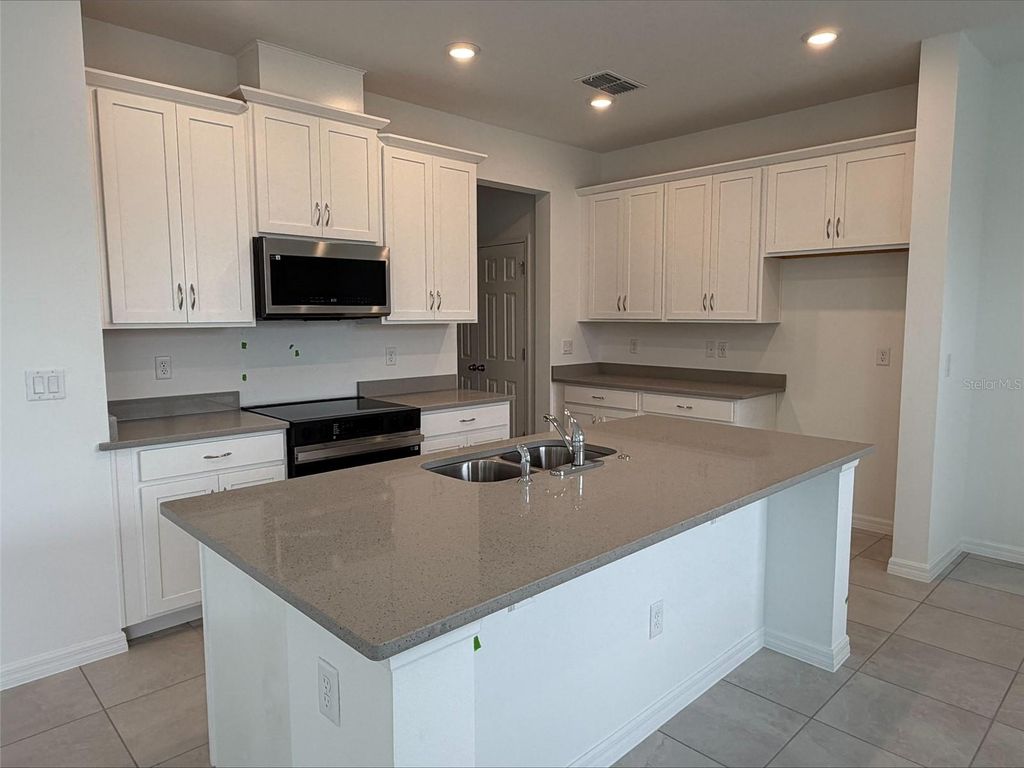 Photo of 1196 Happy Forest Loop, Deland, FL 32720 (MLS # O6390896)