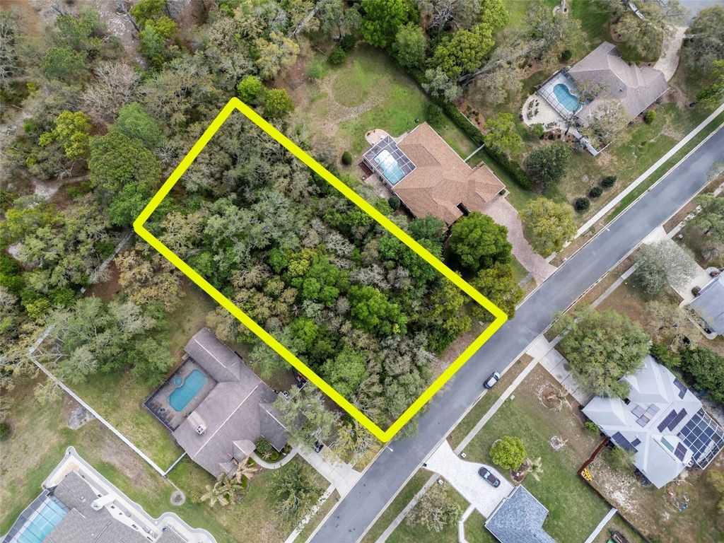 Photo of 111 Winding Oaks Boulevard, Hudson, FL 34667 (MLS # TB8494781)