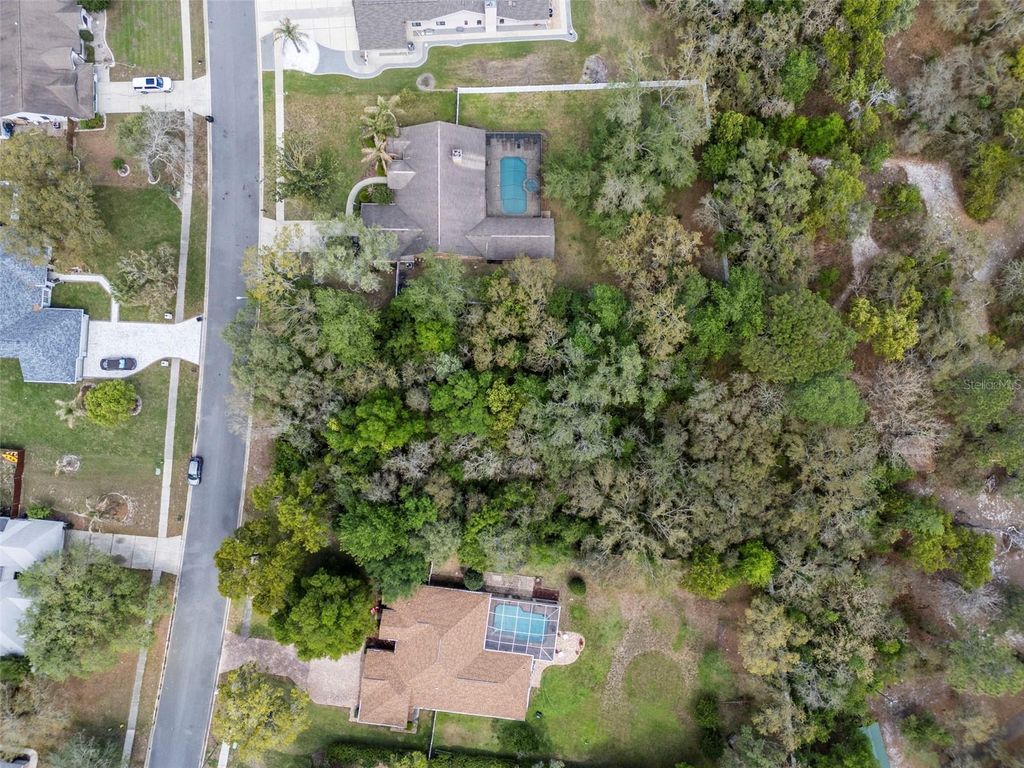 Photo of 111 Winding Oaks Boulevard, Hudson, FL 34667 (MLS # TB8494781)