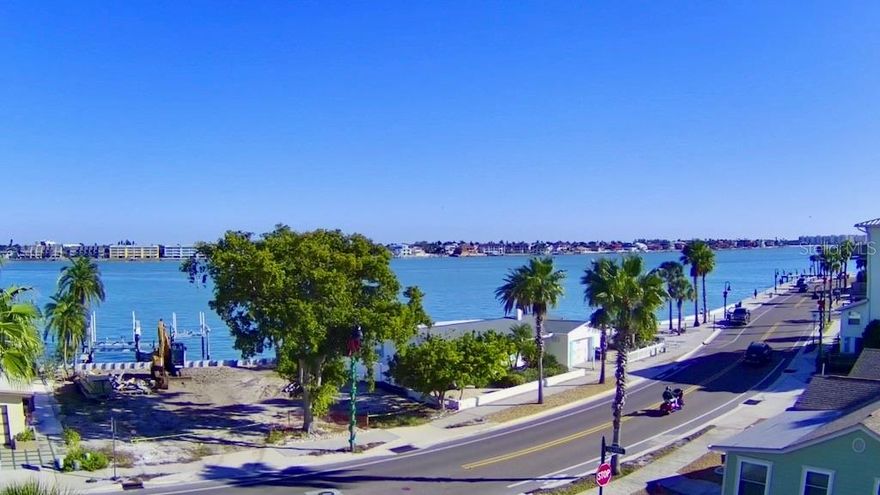 Pass-A-Grille Premier interior lot with protected Intracoastal Waterway views! This unique property looks southeast down Pass-A-Grille Way, across the street is the water giving you amazing views that won’t be blocked! You also have peek a boo views of the Gulf of America for sunsets on the 2nd and 3rd level of a new build. This buildable rectangular lot is already cleared, making it the perfect blank canvas for building your dream beach home. Soil borings results are available! Showing excellent, dense dirt ready for construction! You are less than 2 blocks from the beach sand, five blocks from the main street with shops and restaurants, 6 blocks from Pass-A-Grille Marina for storing your boat, The Don Cesar Hotel is 1.2 miles north. Also 10 minutes from I-275 to get wherever you would like to go. Truly living the dream in Pass-A-Grille!