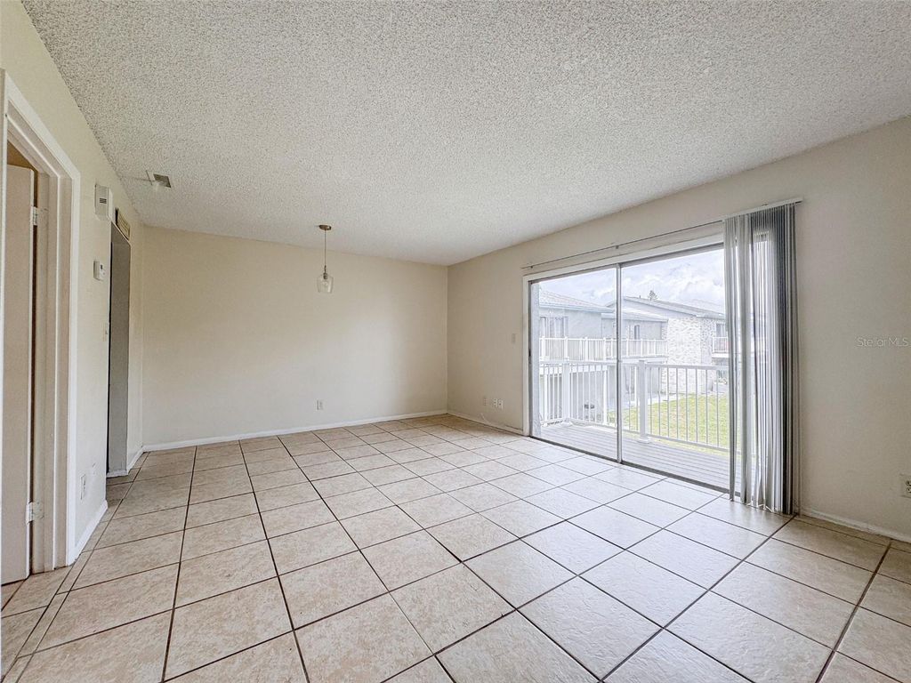 Photo of 7341 Daniel Webster Drive #c-2b, Winter Park, FL 32792 (MLS # O6350080)